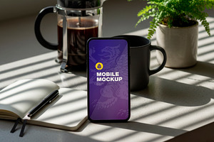Mobile Mockup with Coffee, a Product Mockup by OneVectorStock