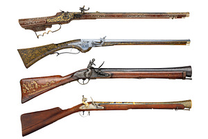 Old ancient rifle firearms isolated, an Industrial Photo by BOOCYS