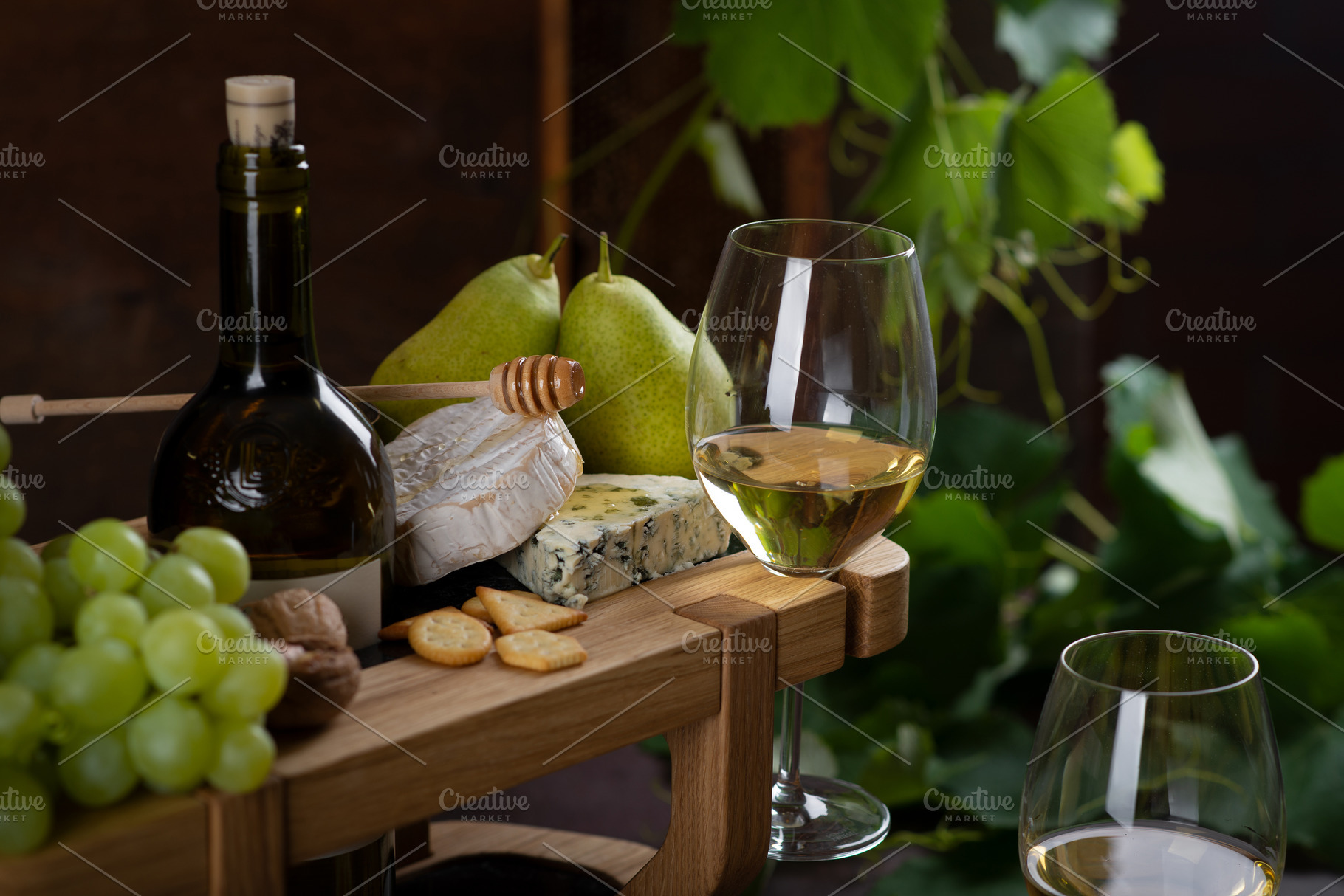 White wine in glasses, pear, cheese, a Food & Drink Photo by nafood