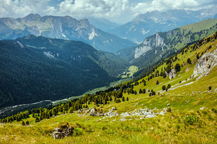 landscape with mountains, hills, clouds and trees, a Nature Photo by Alliance Images