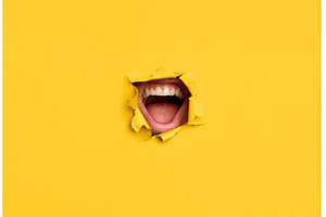 Open mouth through torn yellow pape, an Arts & Entertainment Photo by Gladkov photography