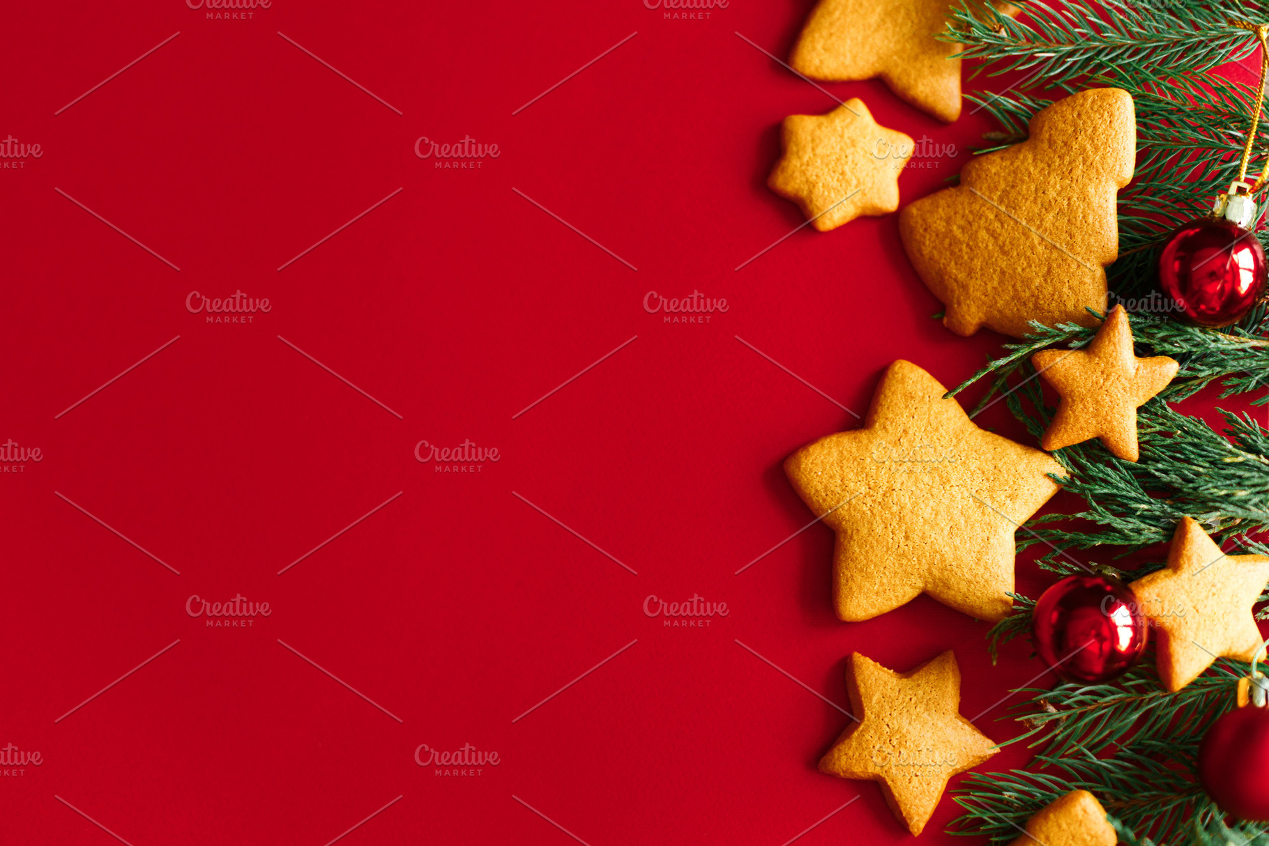 Christmas gingerbread cookies with red baubles and evergreen bra, a Photo by Sonjachni