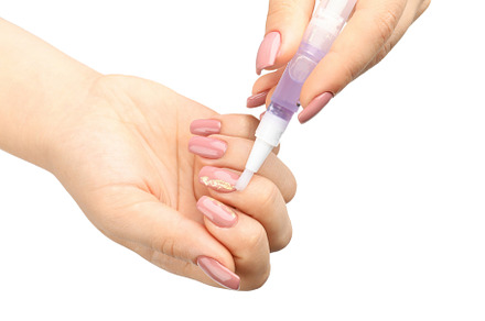 Beautiful female hands with cuticle oil isolated on white bac, a Beauty & Fashion Photo by AtlasStudio PRO