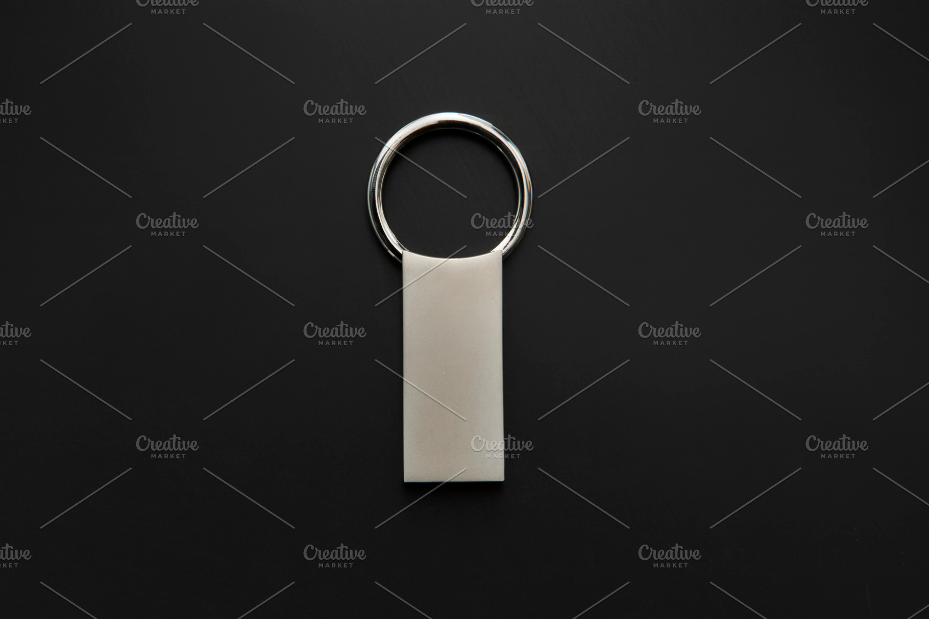 polished silver keychain ring front, a Photo by UN-BRANDED
