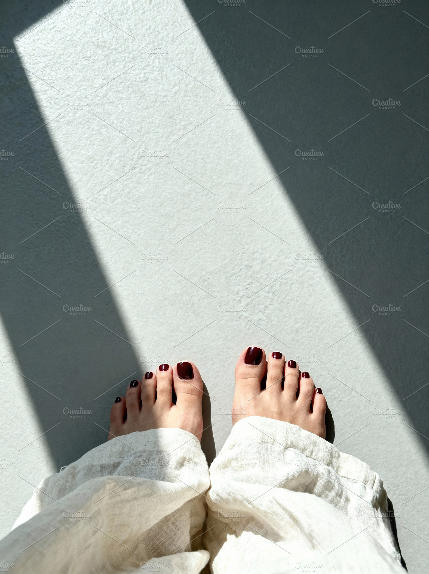 Minimalist Feet with Red Pedicure, a Beauty & Fashion Photo by Virgo Studio