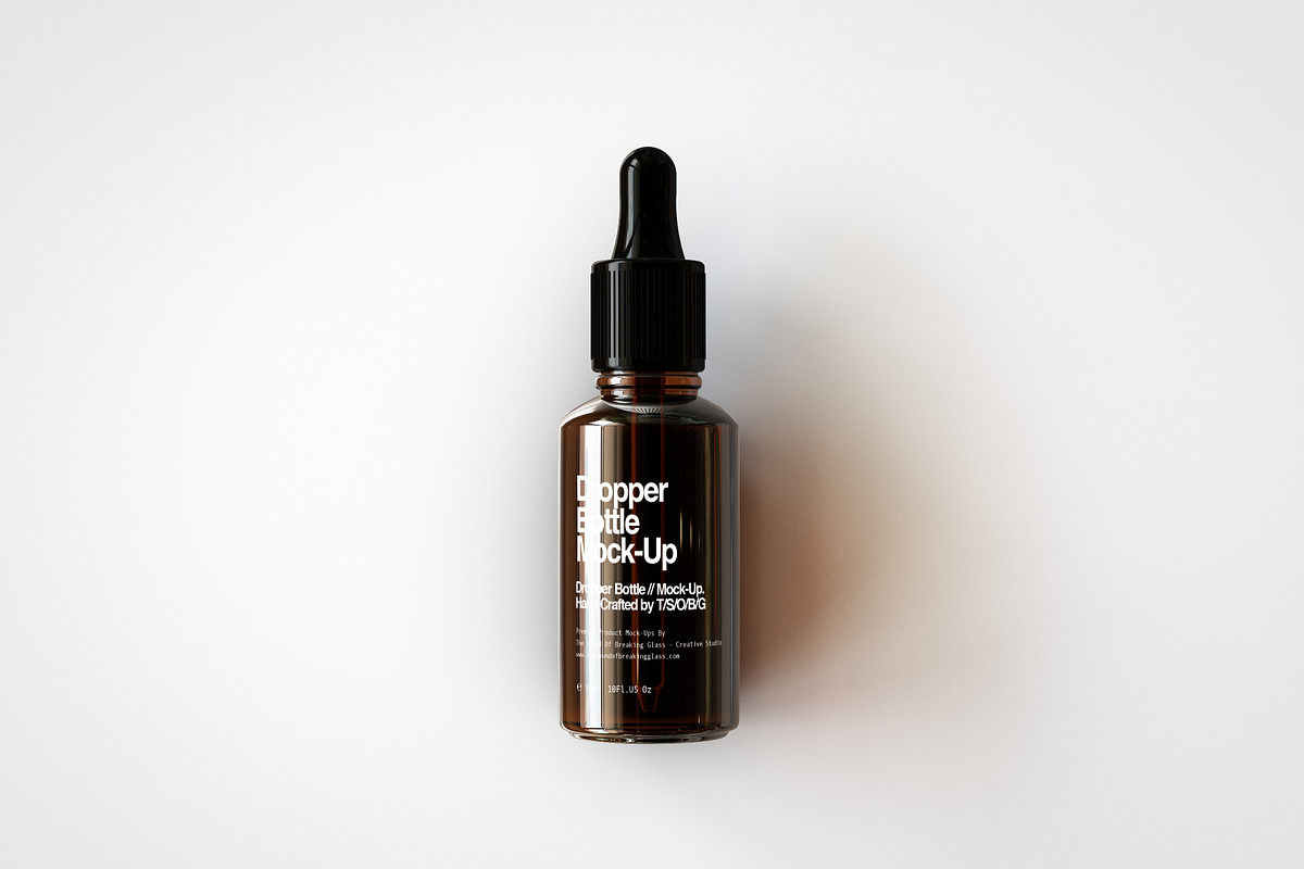 Amber Dropper Bottle Mock-Up & Box, a Household Mockup by TSOBG (Photo 9 of 20)