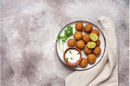 Vegetarian falafel balls with sauce, a Food & Drink Photo by Yulia71
