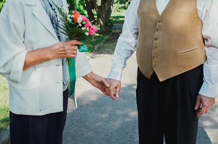 Grandma with bouquet and grandpa