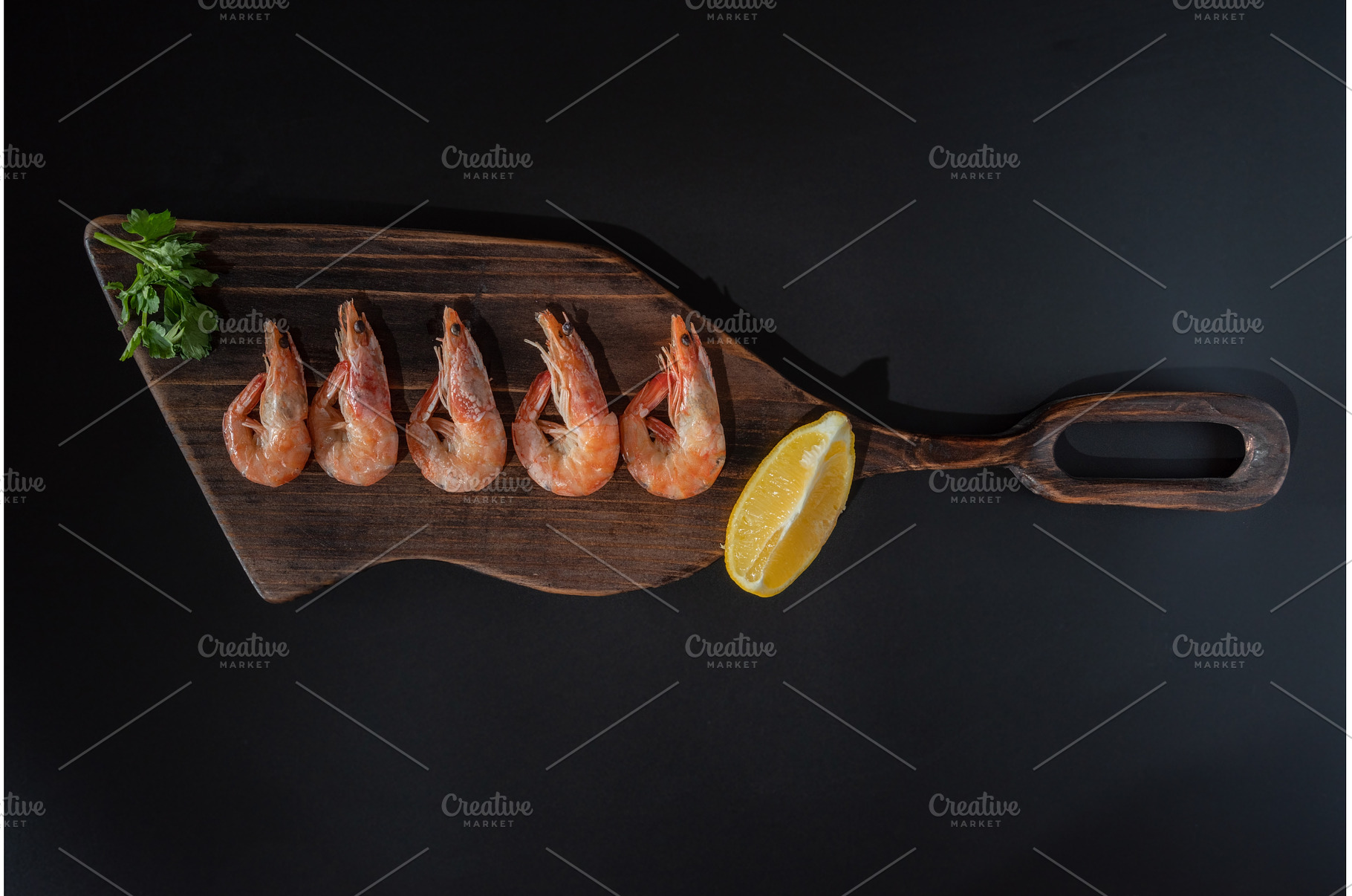 Boiled shrimps on a cutting board, a Food & Drink Photo by Stockphoto by vzwer