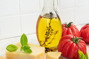 Italian food ingredients for mediterranean cooking concept, a Food & Drink Photo by Olena Rudo