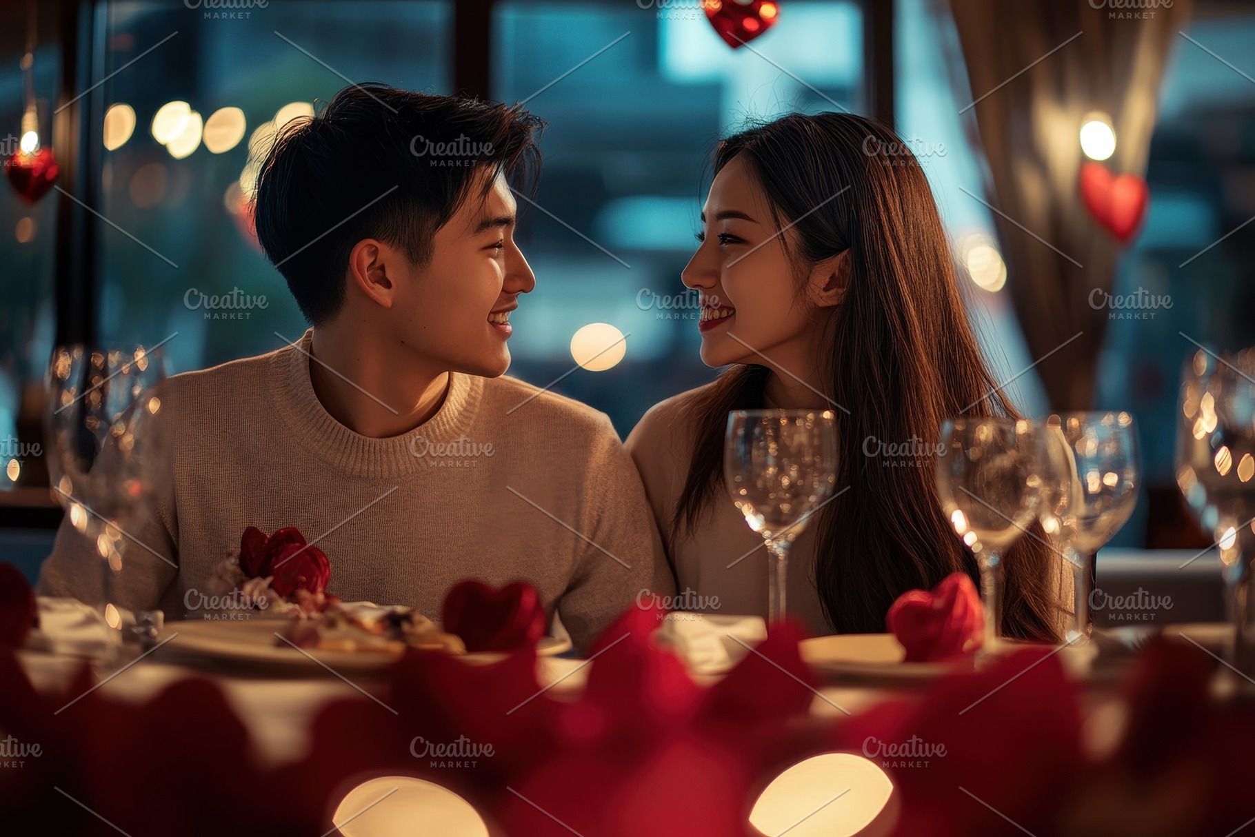 Asian couple enjoys a romantic, a Photo by Pavel_design