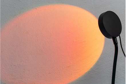Sunset projector lamp on the table, an Abstract Photo by darksoul72