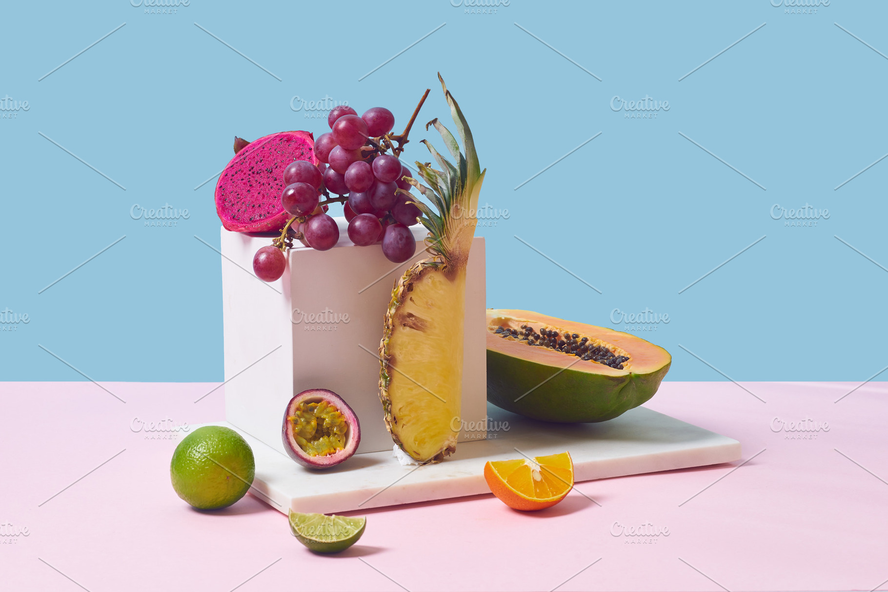 Tropical fruits variety on a colorful background. Side view with, a Food & Drink Photo by Asya Nurullina