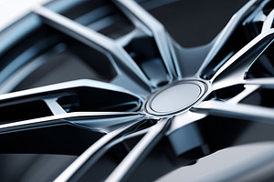 Close up of a shiny black car rim, a Transportation Photo by MistyDay