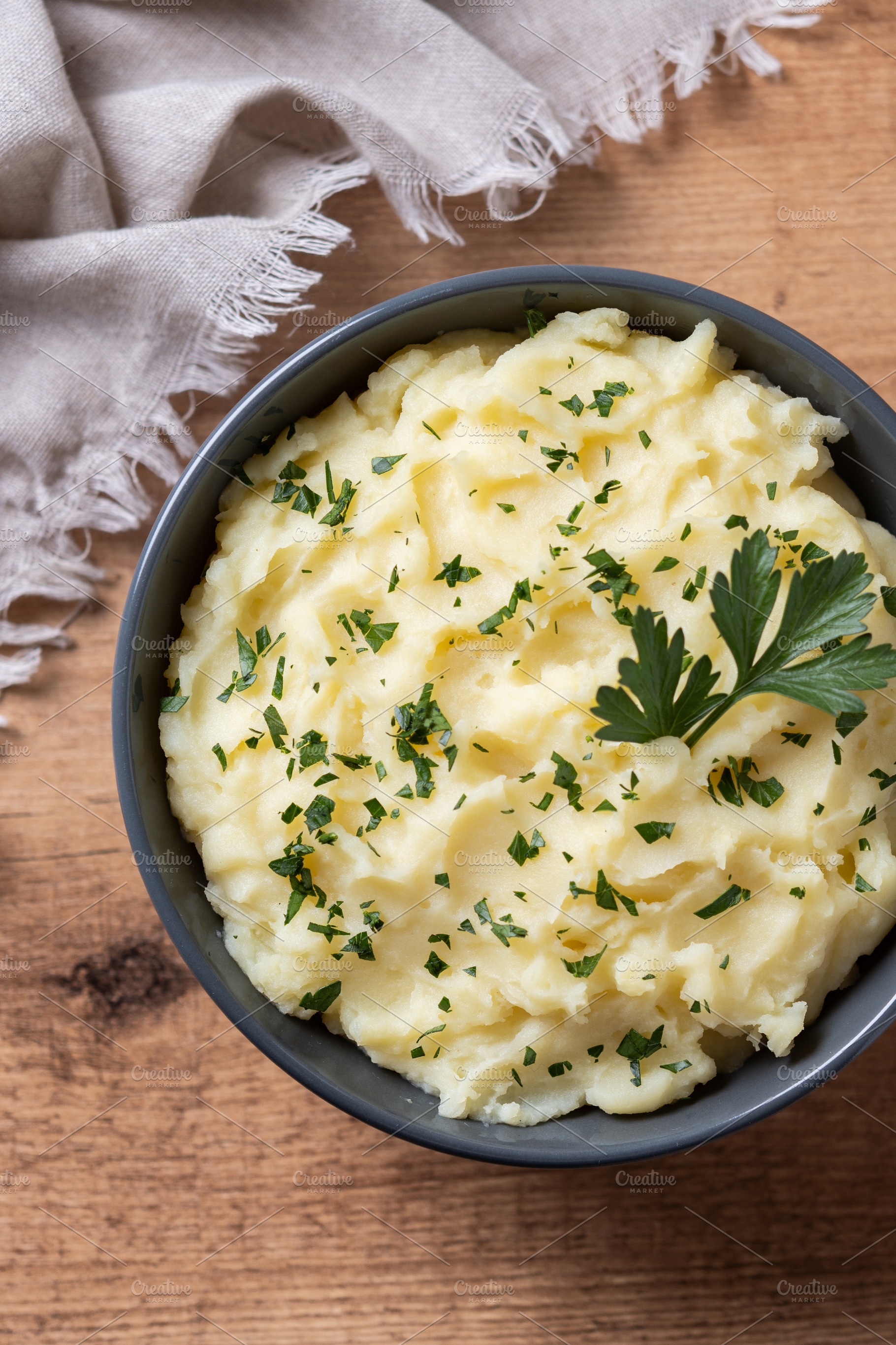 Creamy mashed potatoes in black bowl, a Food & Drink Photo by etorres69