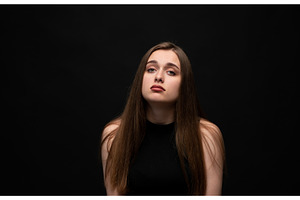 Young woman expressing sorrow and, a Person Photo by volodymyrshtun13795