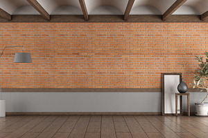 Empty room with brick wall and vault