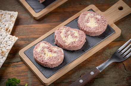 Slices of savory meatloaf with egg filling, a Photo by Grafvision photography