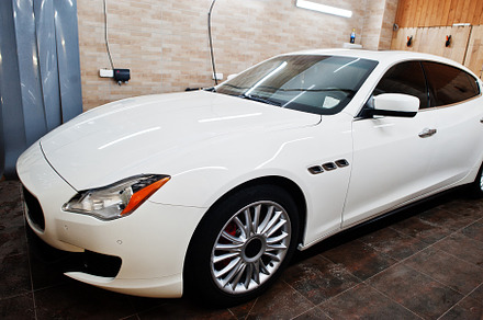 White new luxury sport car in detailing garage., a Transportation Photo by AS photostudio