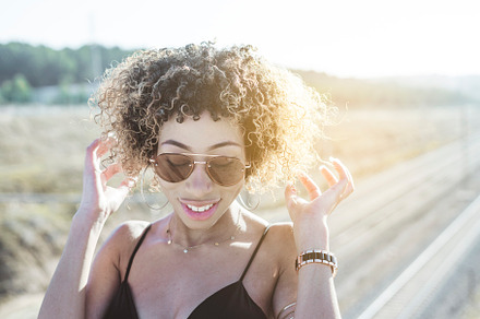 Close up of beautiful american woman stock photo containing portrait and, a Person Photo by karrastock