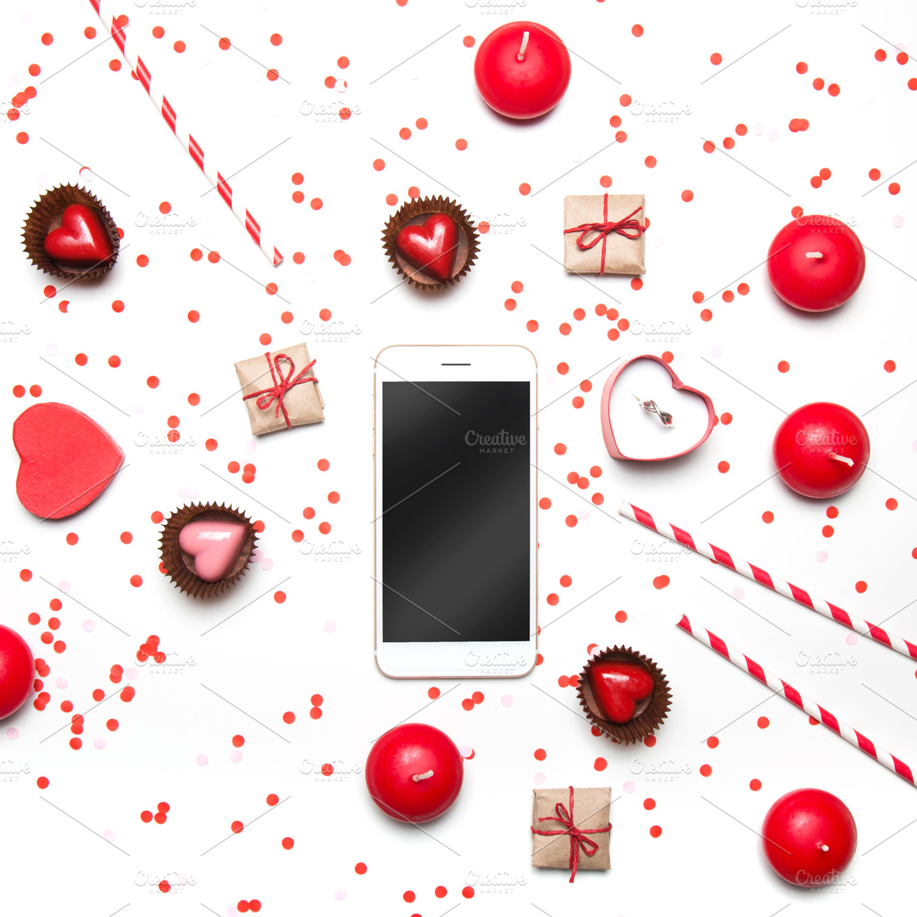 Flatlay with confetti heart & phone featuring anniversary, ad, and birthday, a Holiday Photo by KateAedon