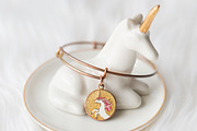 Unicorn jewelry dish + bracelet containing unicorn, white, and gold, a Beauty & Fashion Photo by Morgan Anderson (Thumbnail 2 of 2)