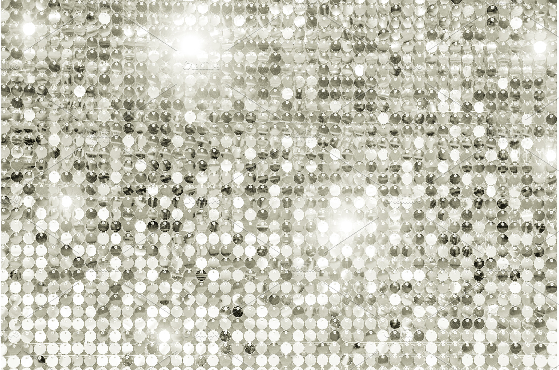 Shimmering silver disco ball sequins, a Background Photo by Anna Efetova