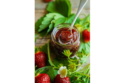 Homemade strawberry jam in a jar, a Food & Drink Photo by yanadjana