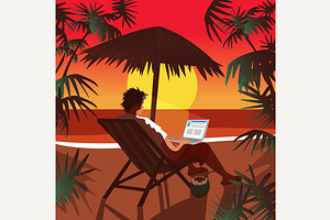 Man working on notebook on beach