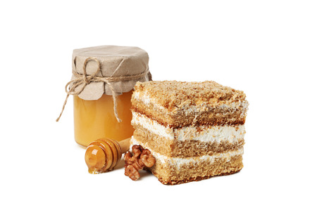 Concept of sweets, honey cake, isolated on white background, a Food & Drink Photo by AtlasStudio