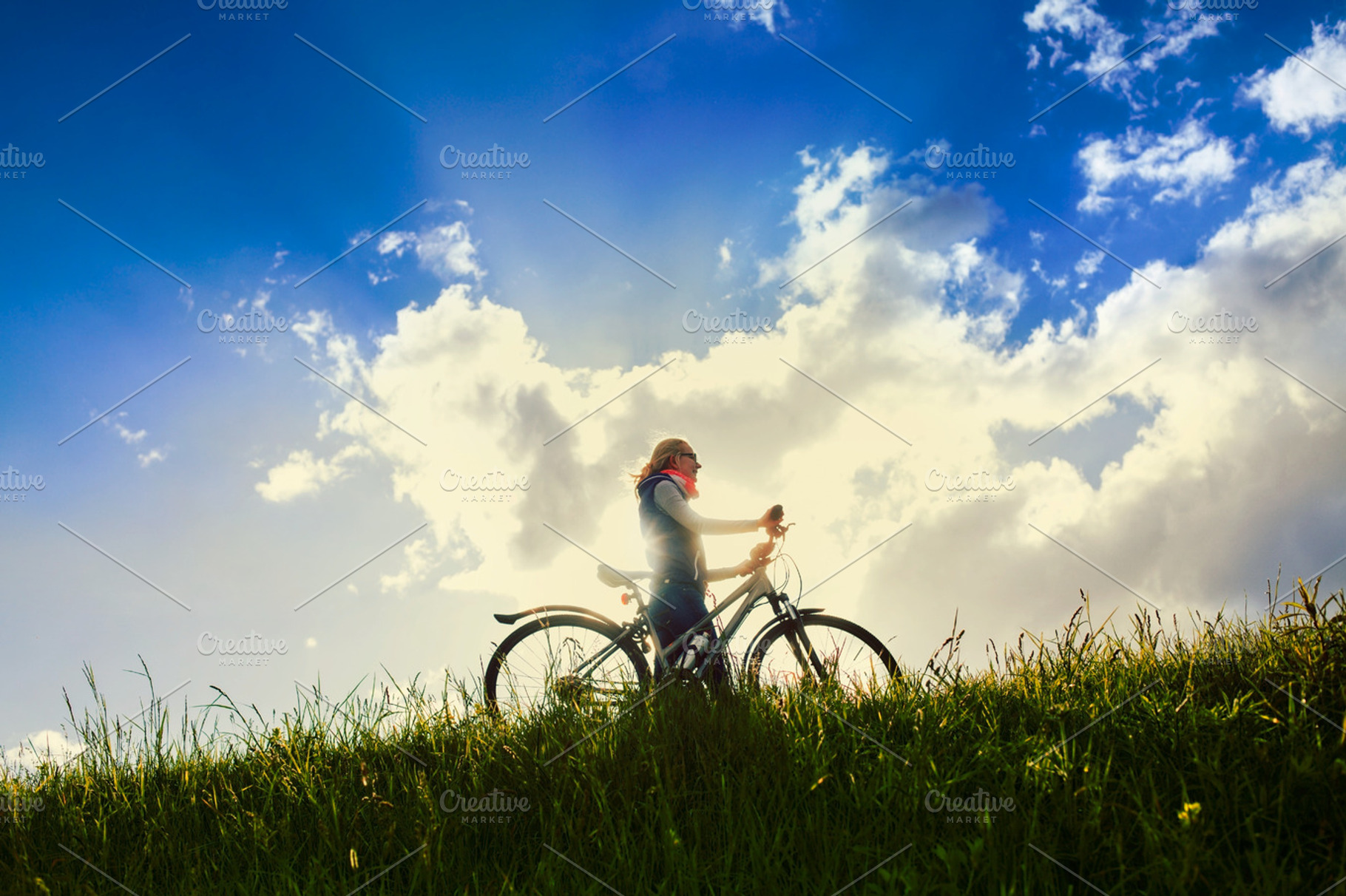 Girl With Bike Over Sky