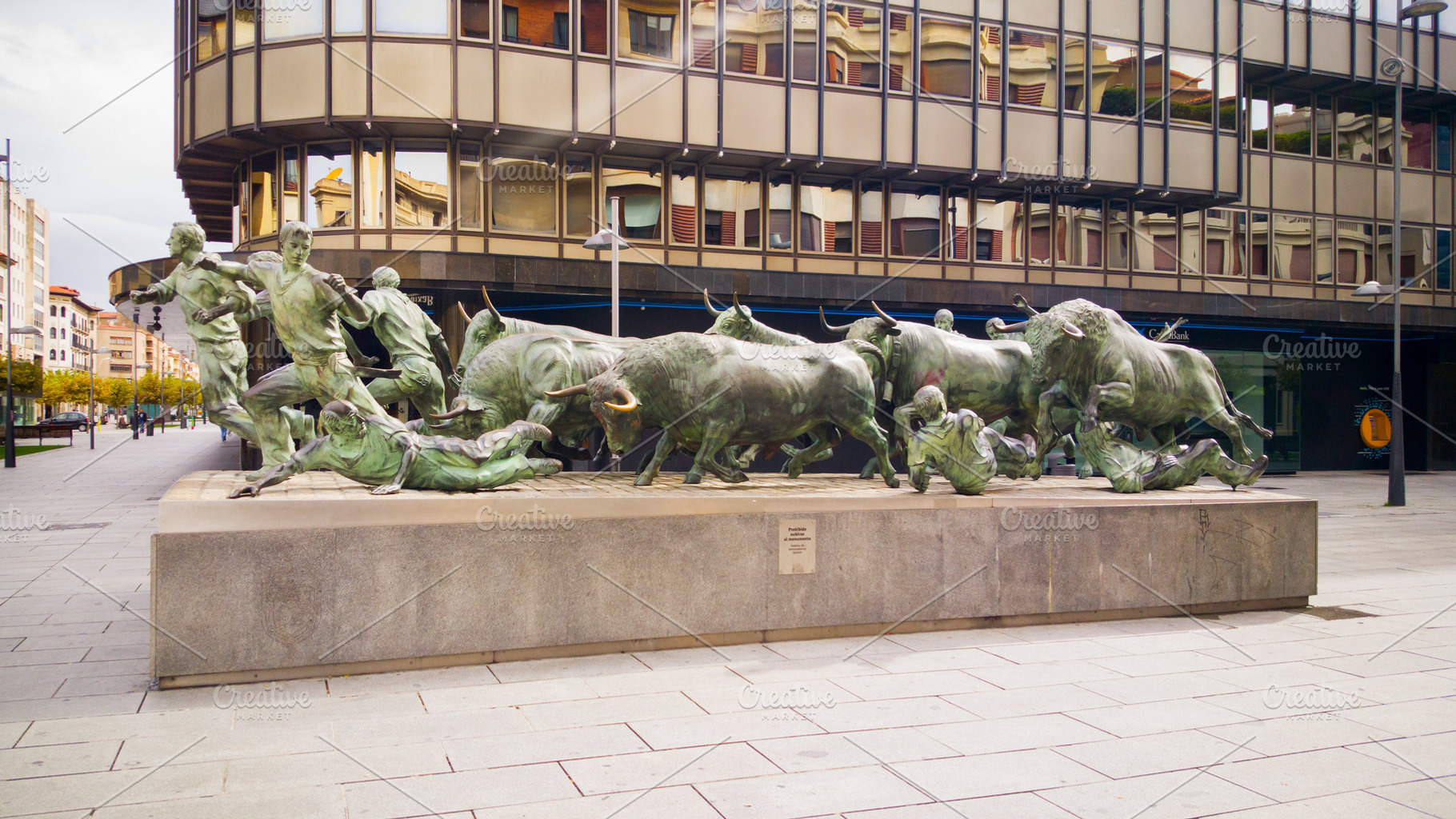 Running bulls monument in Pamplona, a Photo by saiko3p