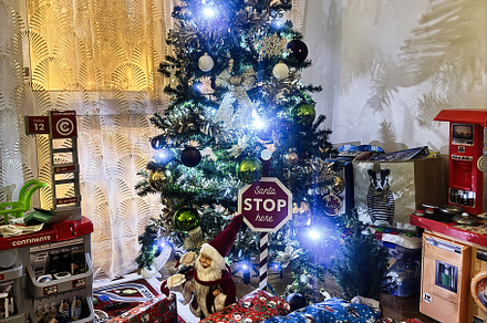 Beautifully Decorated Christmas Tree with Gifts in Lisbon Portugal, a Photo by AS photostudio