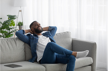 Happy satisfied relaxed young black, a Person Photo by Prostock-Studio