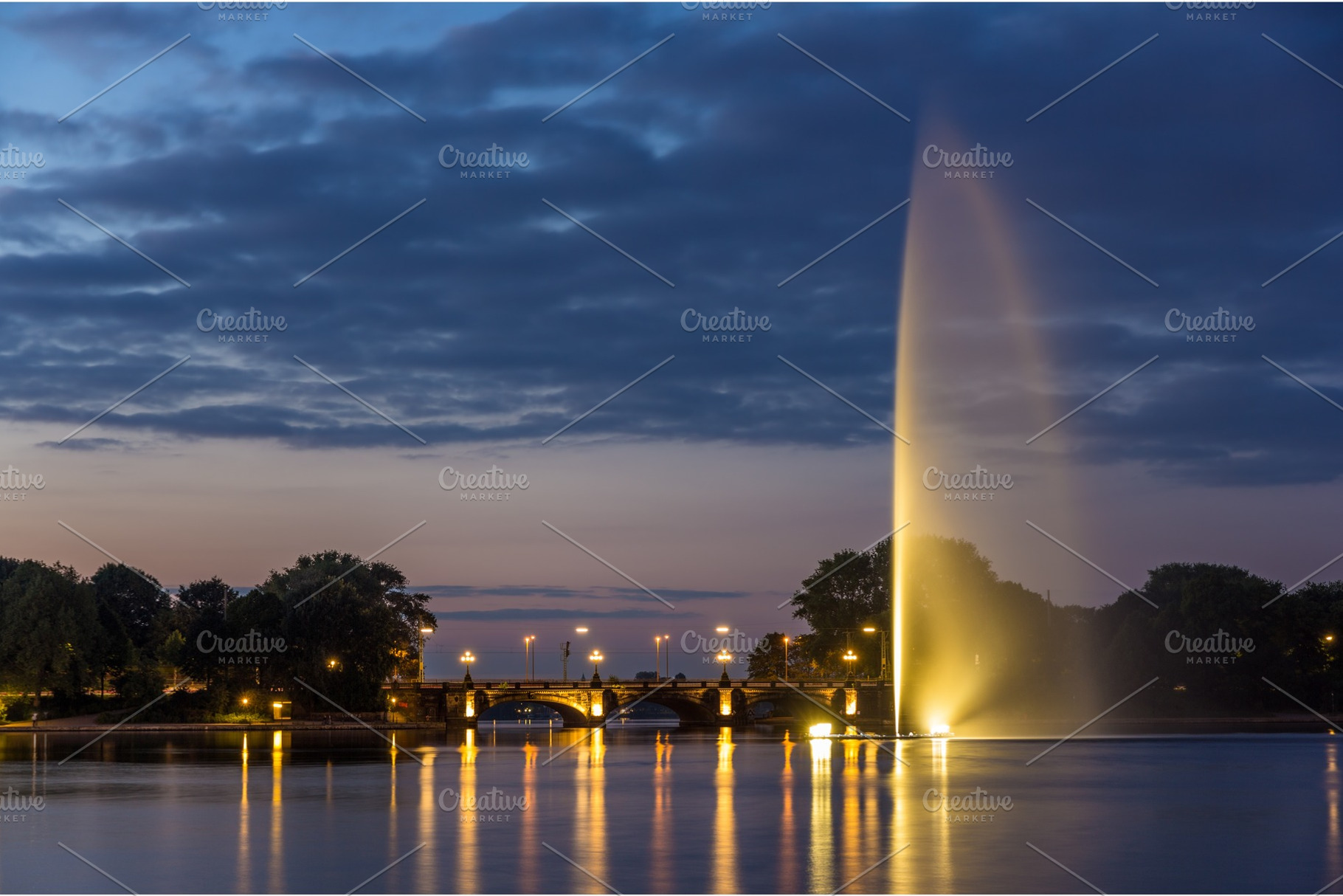 Fountain and Lombardsbrucke in Hamburg, Germany, an Architecture Photo by Leonid Andronov