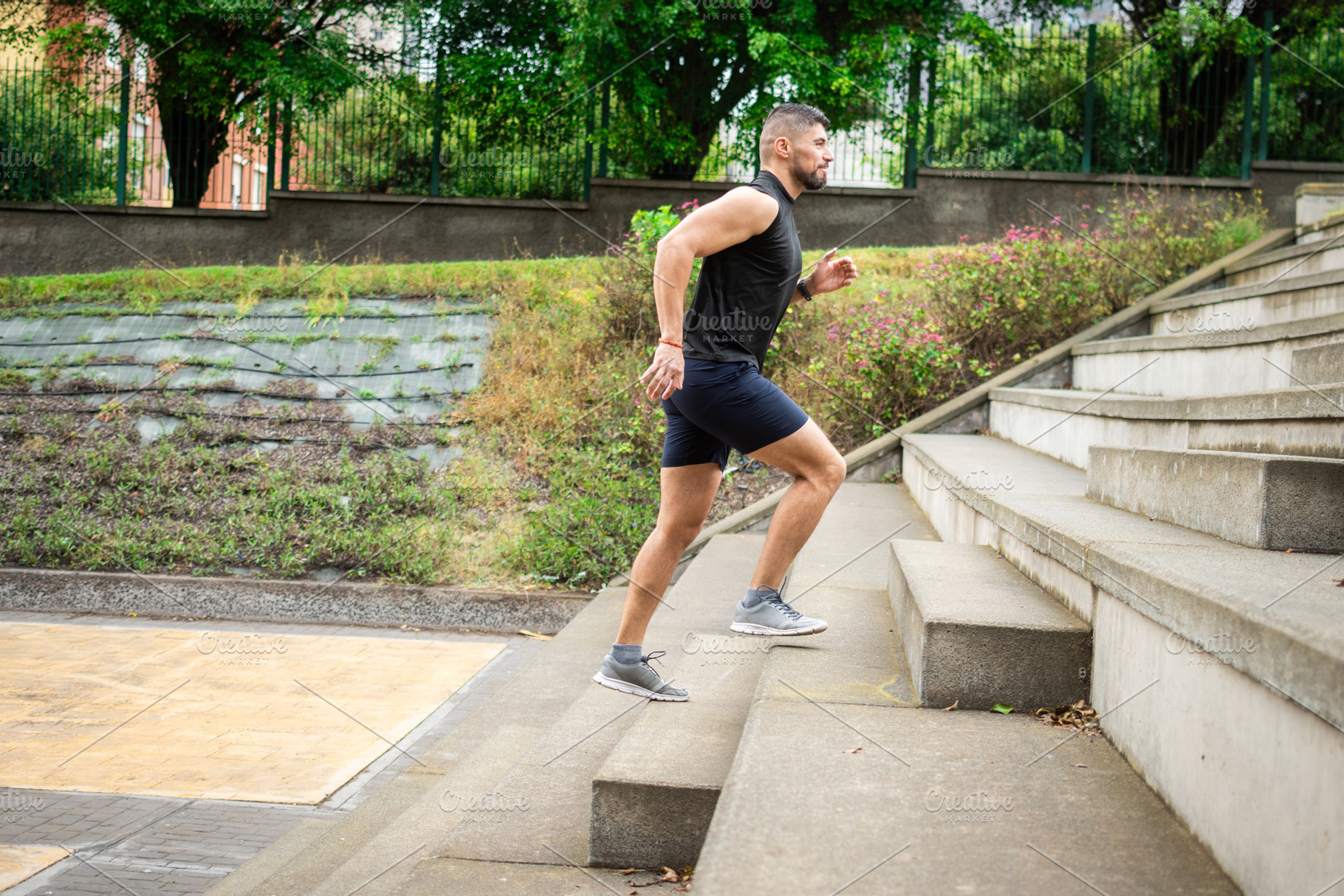 Athletic man running up stairs during outdoor cardio workout, a Sports & Recreation Photo by etorres69