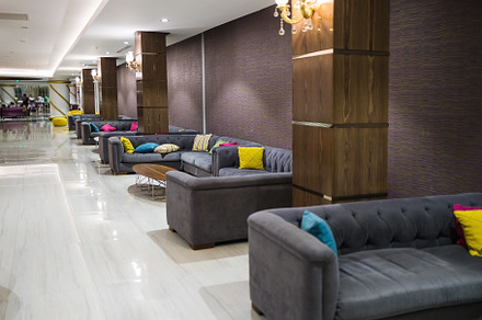 a variety of modern style sofas in the lobby of a Turkish hotel, an Architecture Photo by TanaCh