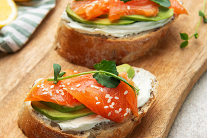 Smoked salmon toast with avocado and cream cheese, a Food & Drink Photo by Olena Rudo