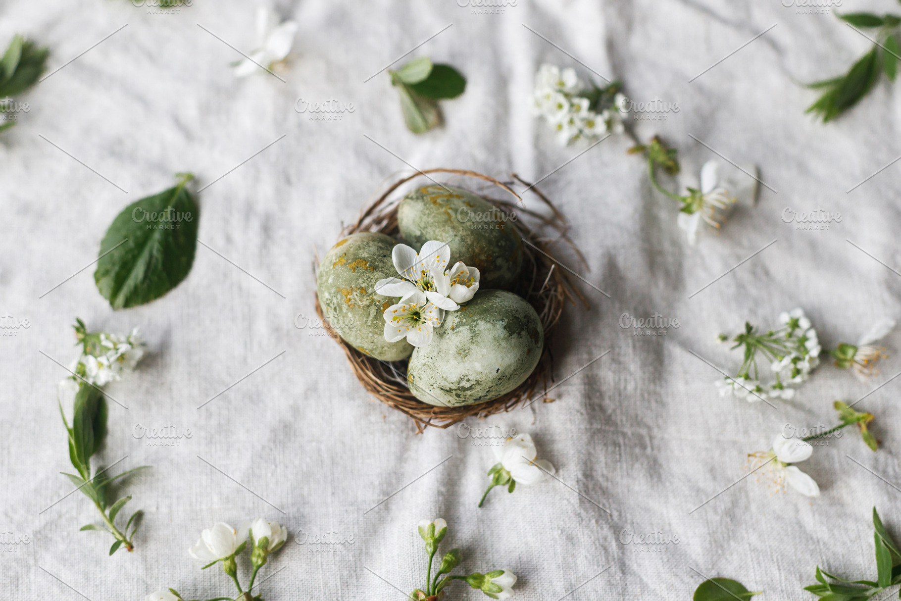 Easter flat lay. Stylish easter eggs in nest, flowers and cherry, a Holiday Photo by Sonjachni