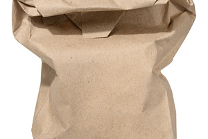 Brown kraft paper bag for packaging products in stores on an iso, an Industrial Photo by ndanko