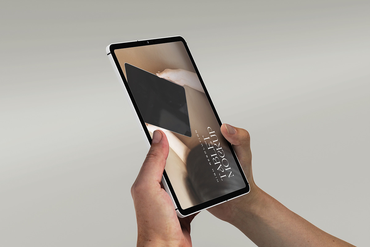 Digital Tablet Holding Mockup Scene, an iPad Mockup by Ataku Design (Photo 3 of 8)
