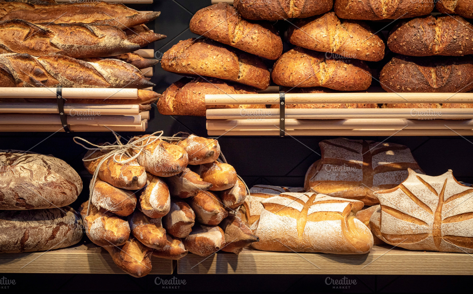 Bread assortment on bakery wooden sh, a Food & Drink Photo by YesPhotographers