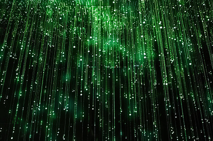 Bright green lights cascade like dig, a Photo by Tanuart