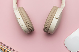 Wireless headphones, coffee, keyboard, eyeglasses, and notebook, a Business Photo by Olena Rudo