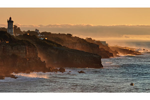 Farol da Guia lighthouse on Cascais, a Nature Photo by Goinyk