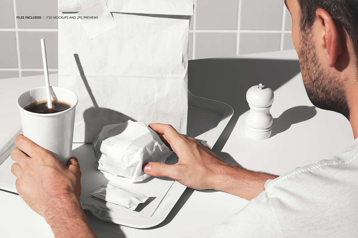 Person in Fast Food Burger Restauran, a Packaging Mockup by creatsy5 (Photo 2 of 6)
