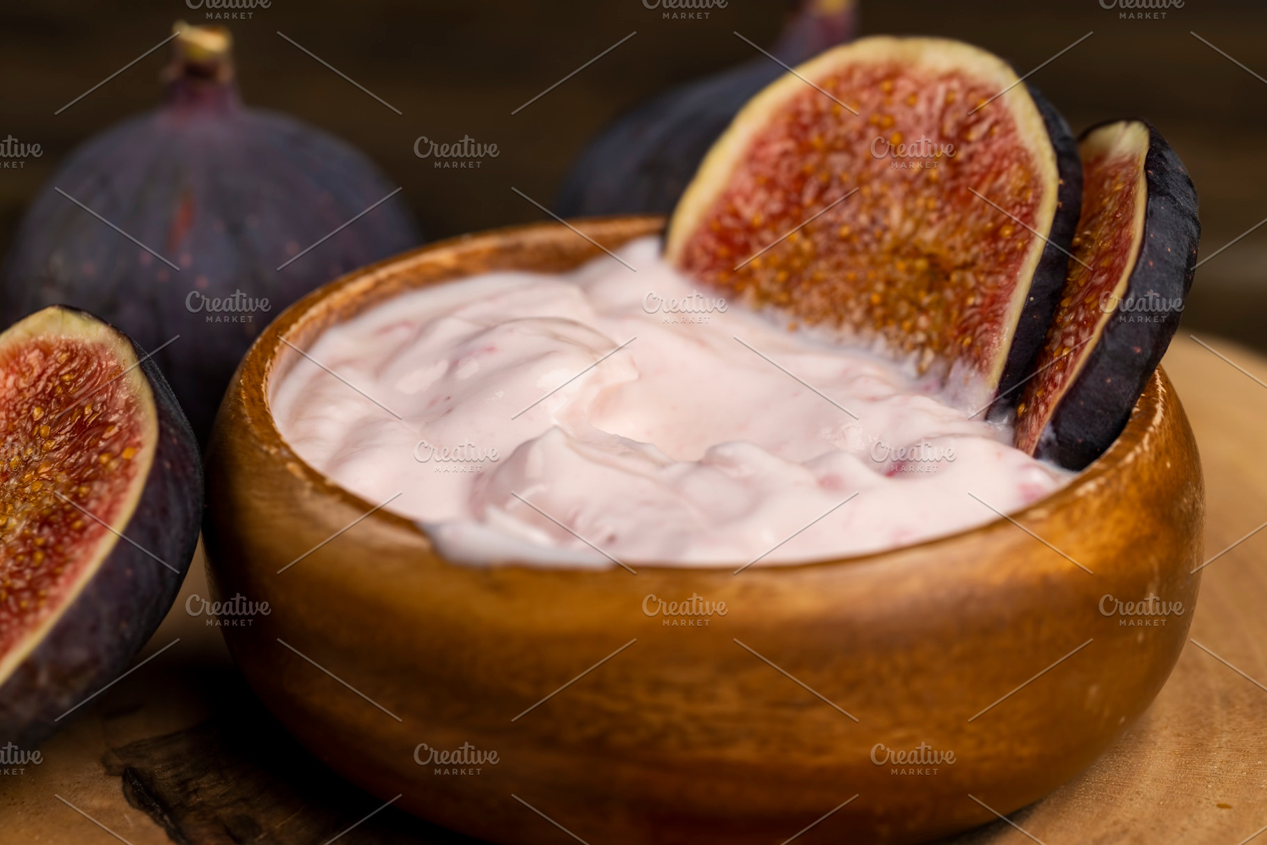 fresh yogurt with fresh figs, fresh pink yogurt with fig flavor in a wooden bow, a Photo by rsoollAI