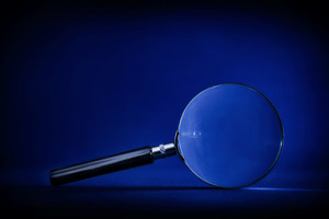 Magnifying Glass on Blue Background, a Business Photo by Davizro's Market