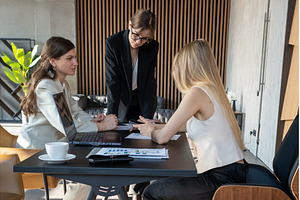 Business meeting with women in, a Business Photo by undrey