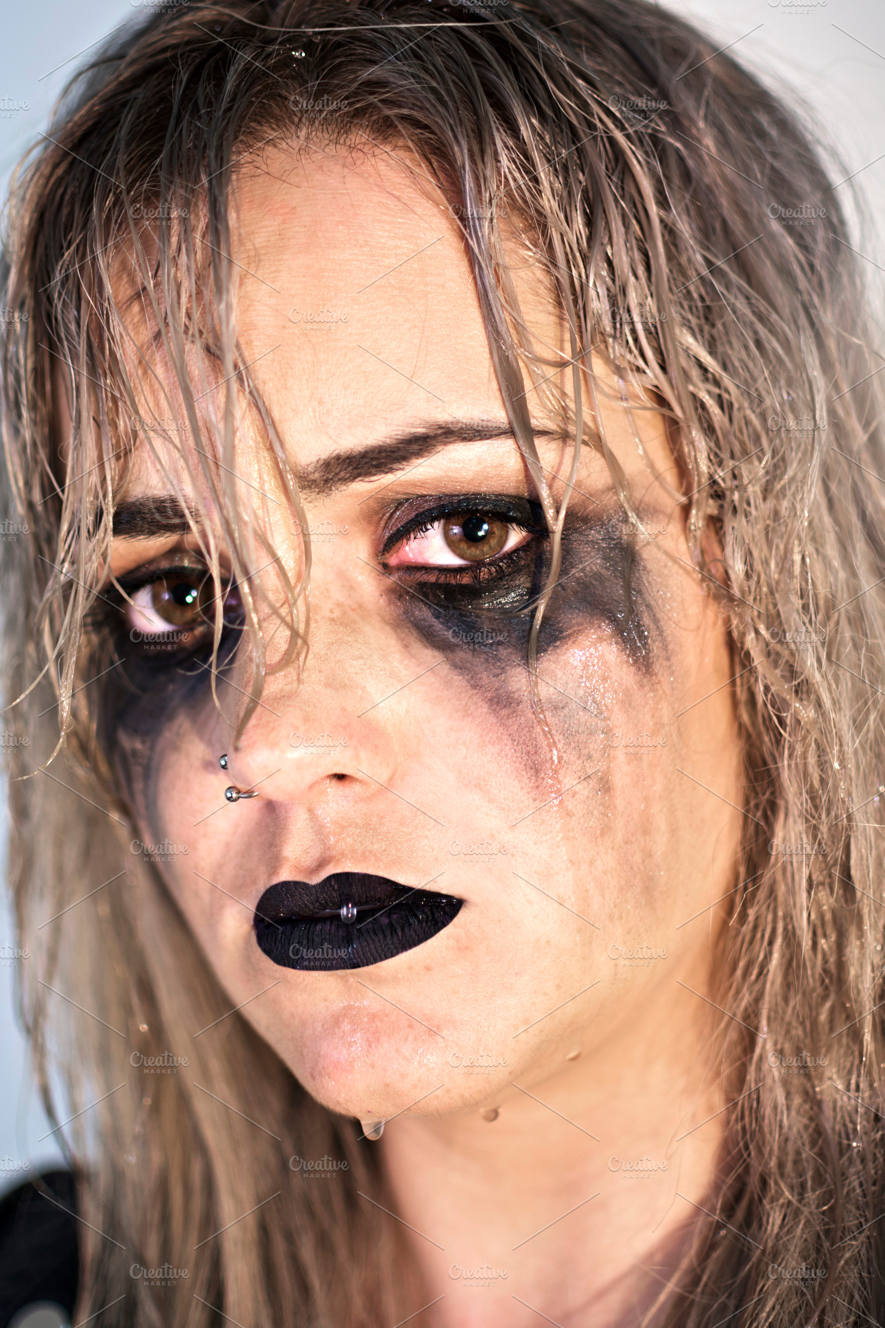 Woman with makeup spoiled by tears featuring woman, portrait, and tears, a Person Photo by RaquelVizcaíno